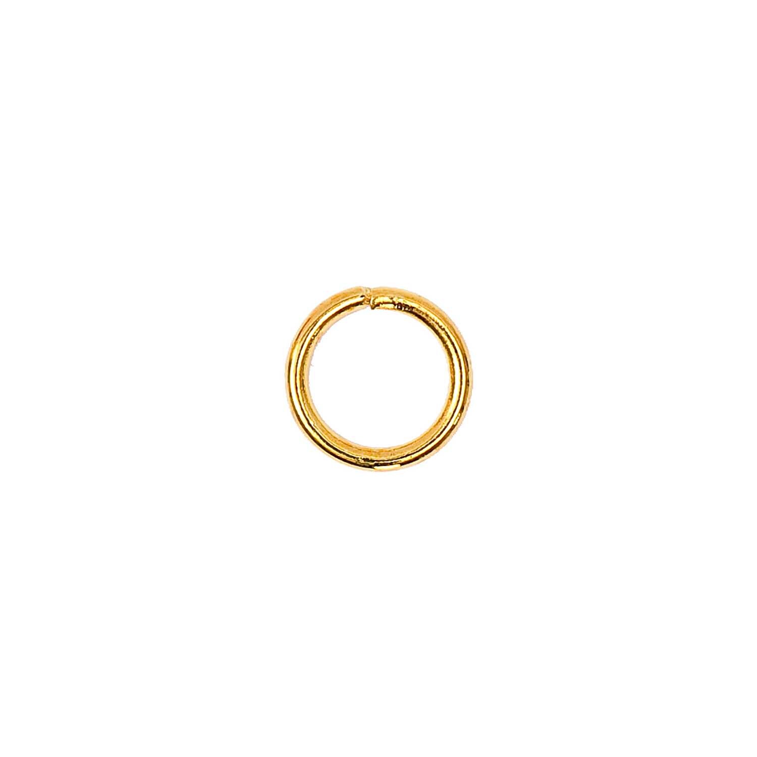 Öse gold 4mm 20 Stück von Rico Design. Goldene Öse in Nahaufnahme, ideal für Bastelprojekte.