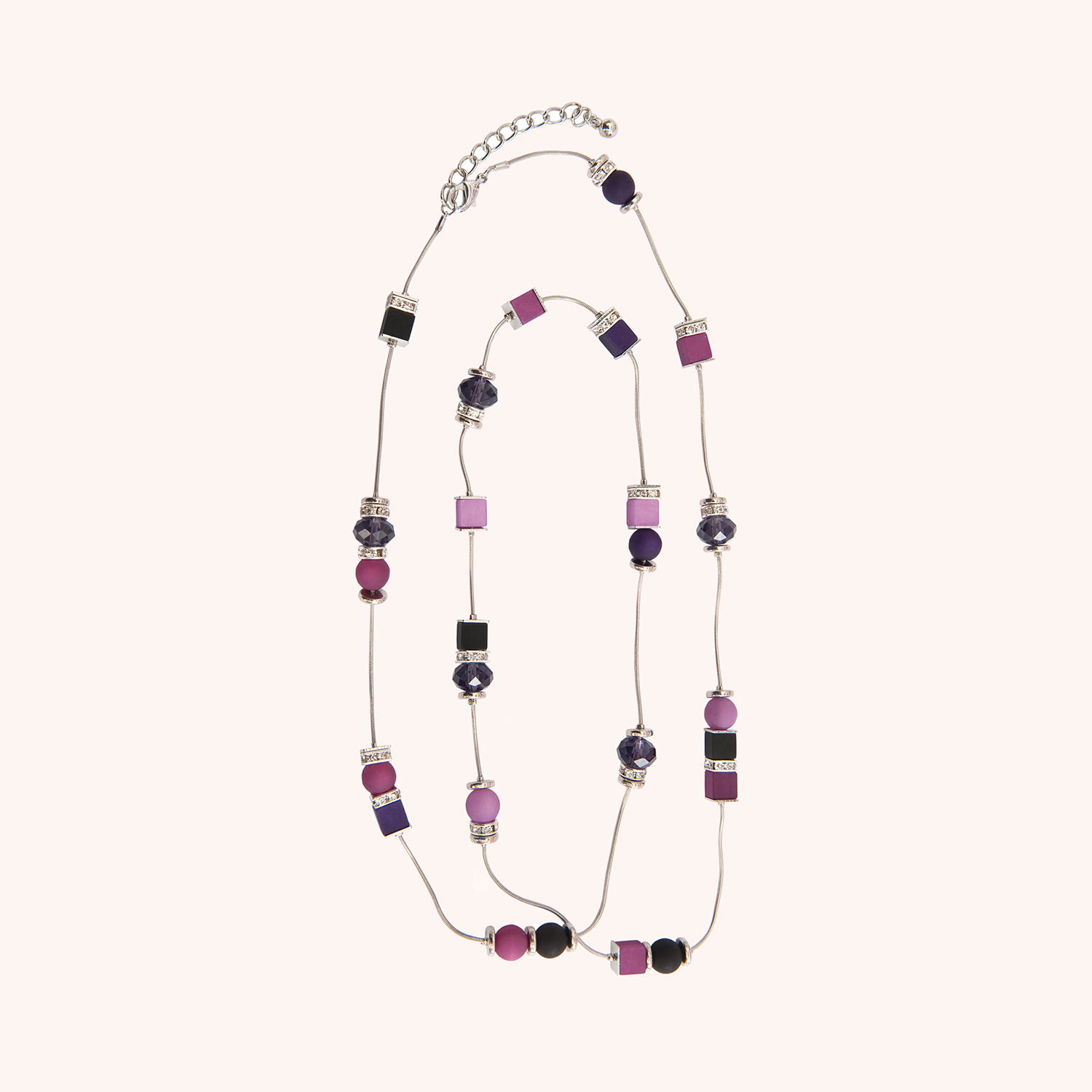 Anleitung Polaris Blumenbox Kette basteln: Lange Kette mit bunten Perlen in Lila- und Pinktönen.