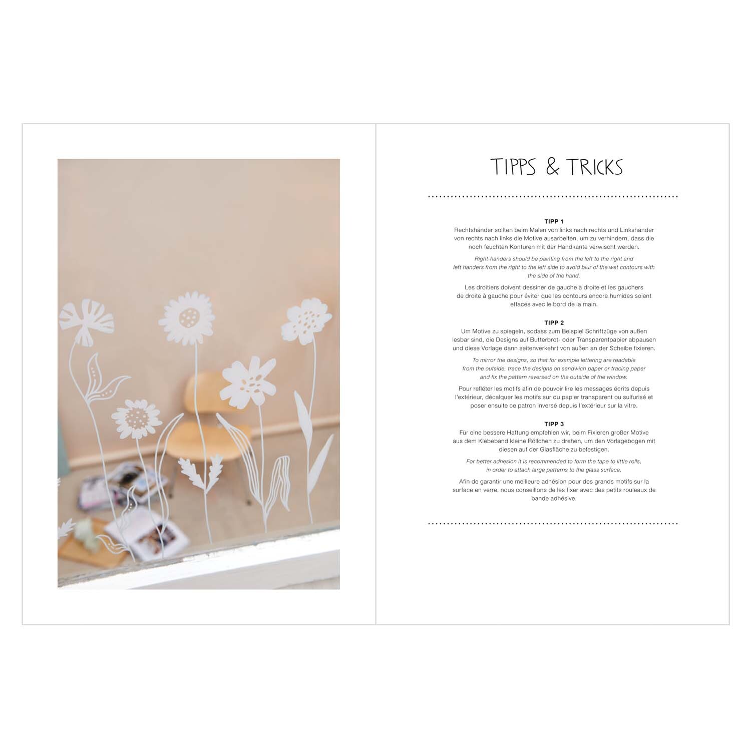 Vorlagenmappe Transformation Fenster- und Glasmalerei mit Kreidestiften zeigt weiße Blumenmotive auf Glas. Tipps & Tricks für kreative Gestaltung.