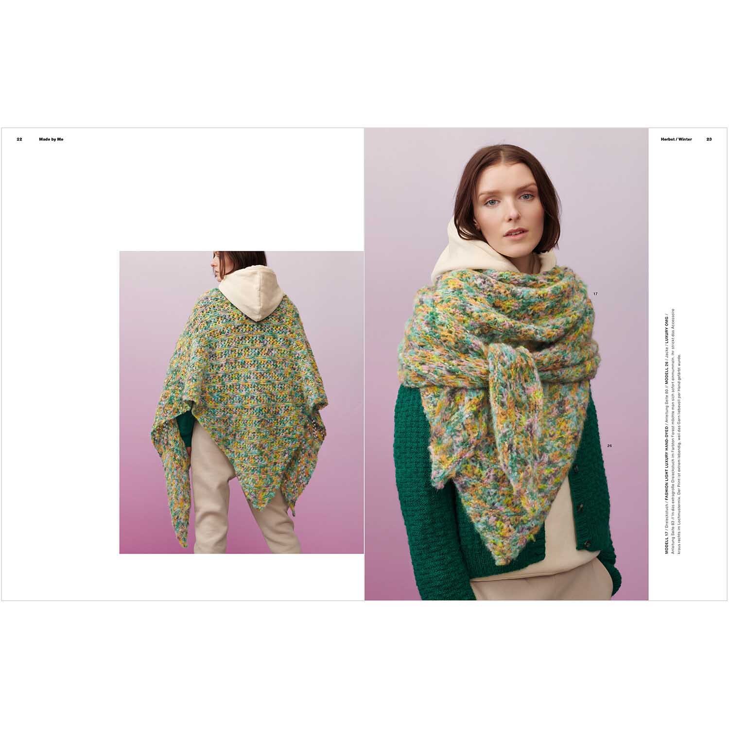 Made by Me Handknitting Nr.13 Herbst-Winter: Frau trägt gestrickten, bunten Schal von Rico Design über grünem Pullover.