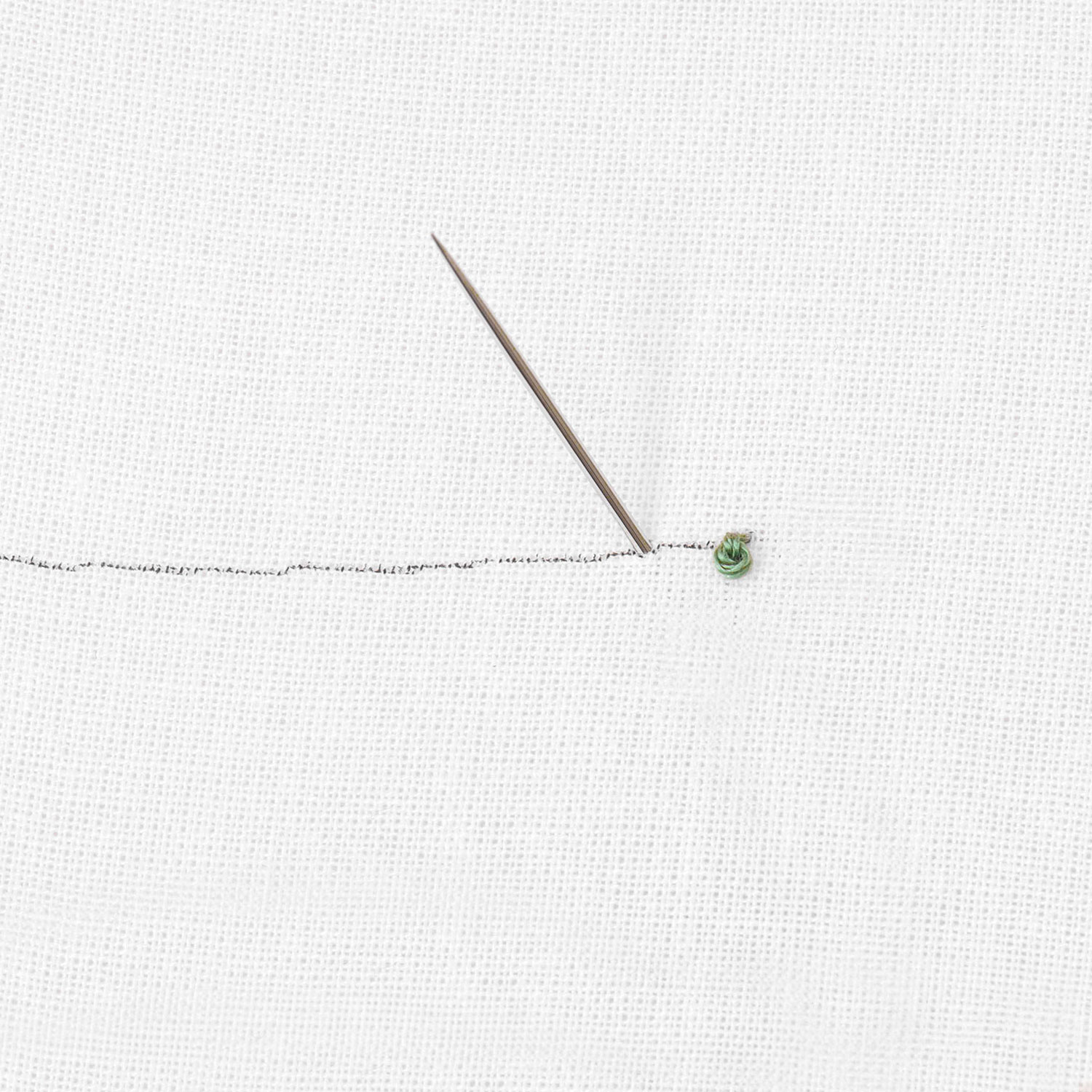 Schritt 4 in der Stickanleitung für einen Korallenstich