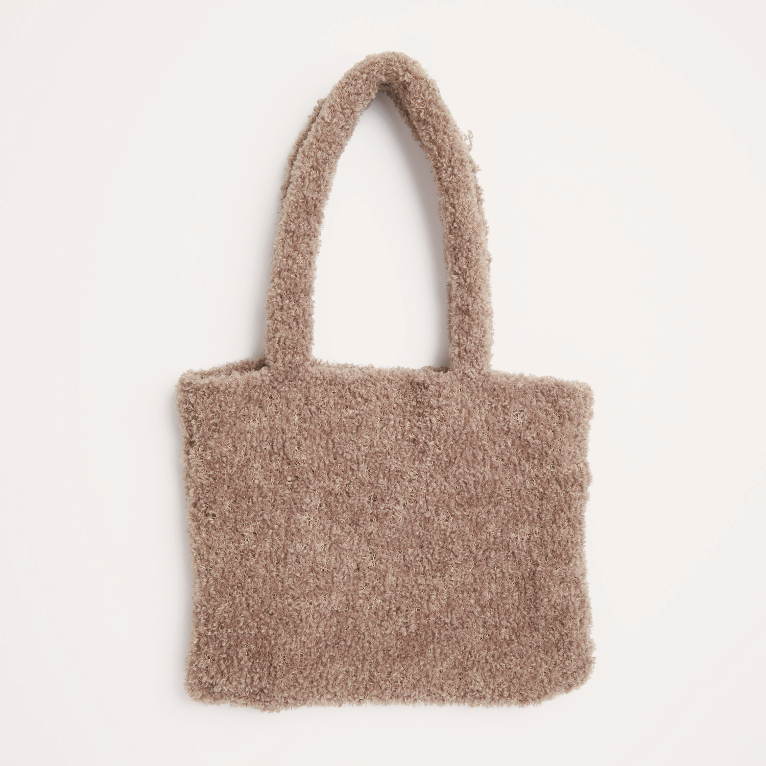 Strickset Tasche Modell 09 aus flauschigem, braunem Garn von Rico Design, ideal für Herbst-Winter.