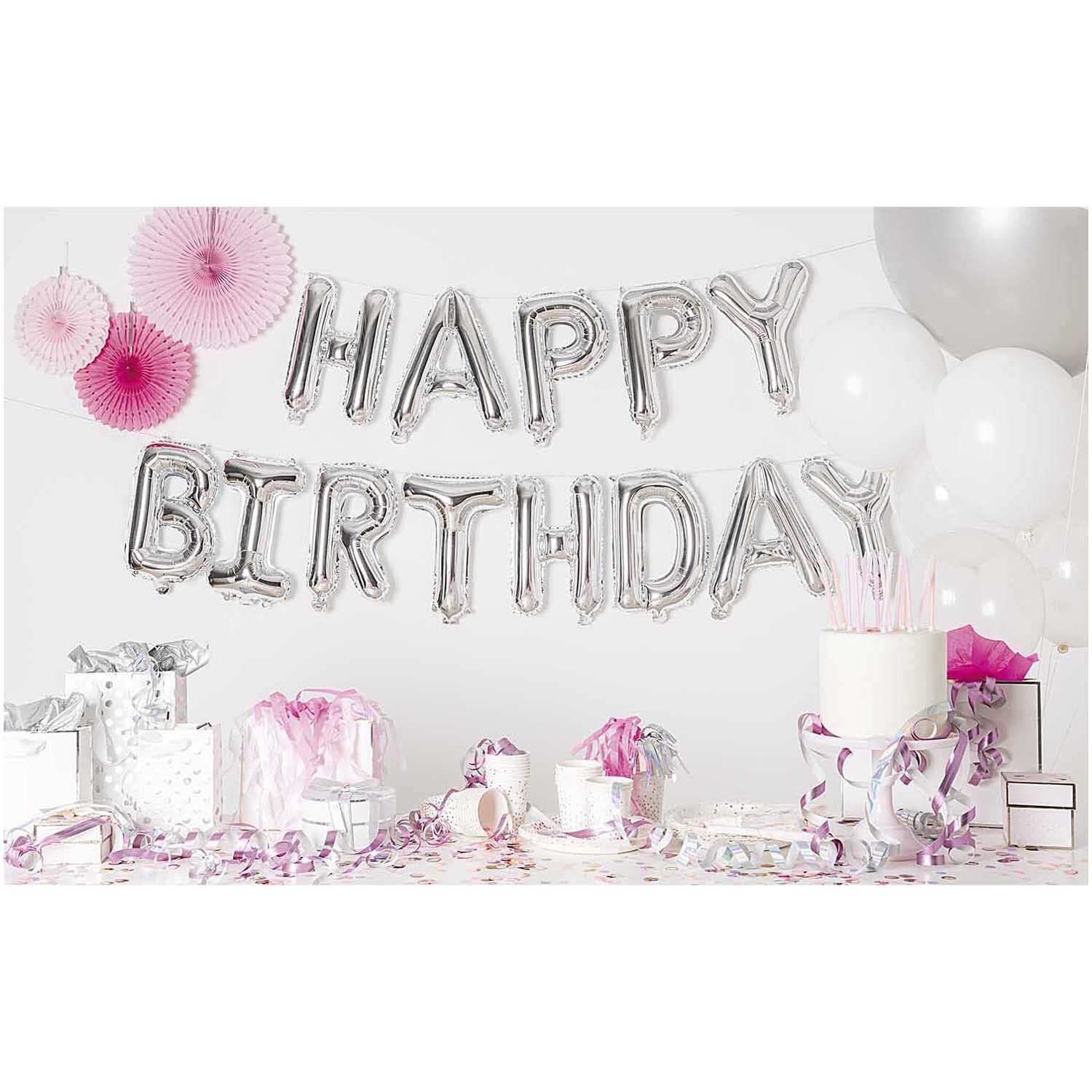 Folienballon-Set Happy Birthday silber, 13-teilig, dekoriert mit rosa und weißen Partyaccessoires.