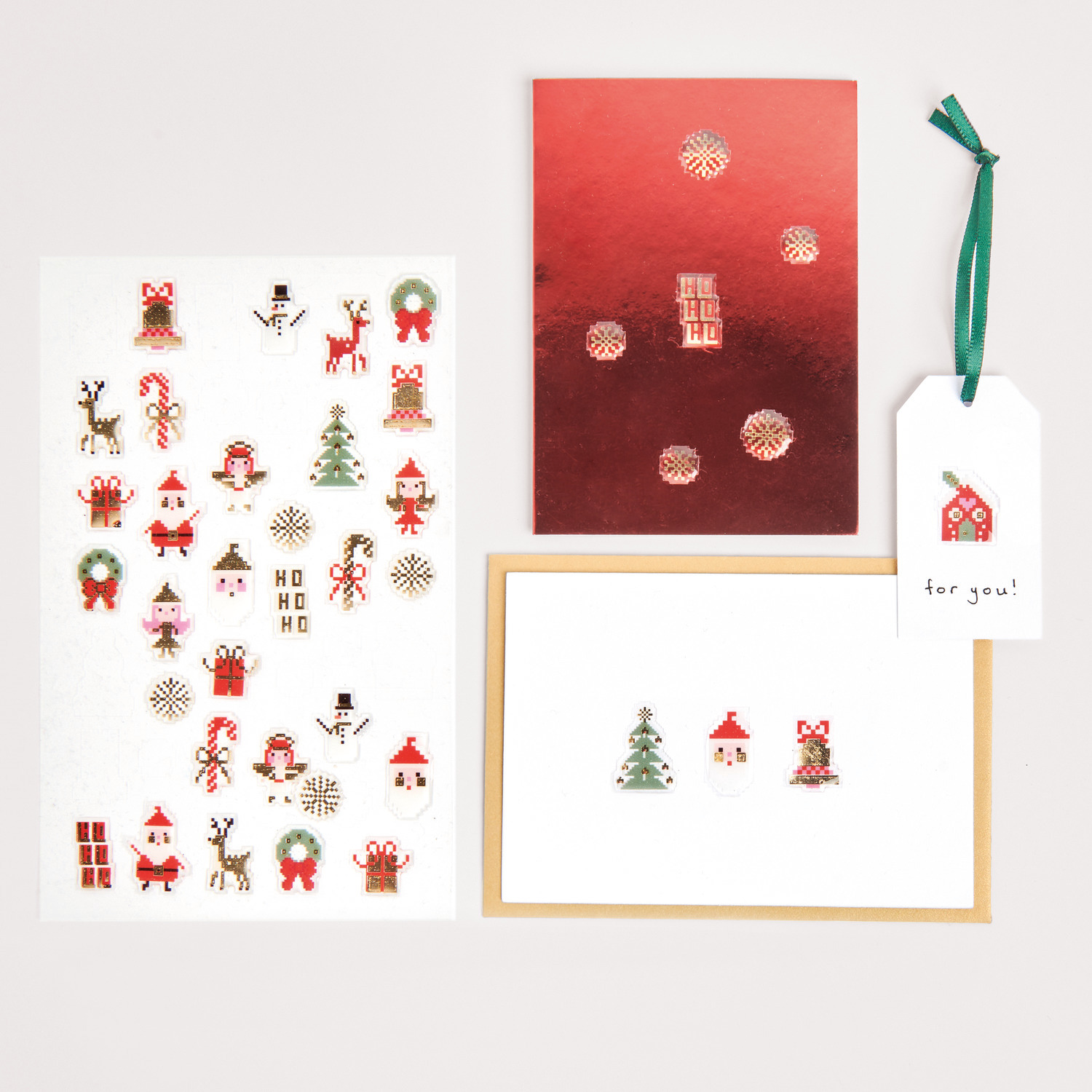 Paper Poetry Gelsticker Weihnachtsfiguren Pixel: Festliche Sticker auf weißem Blatt, ideal für kreative Weihnachtsprojekte.