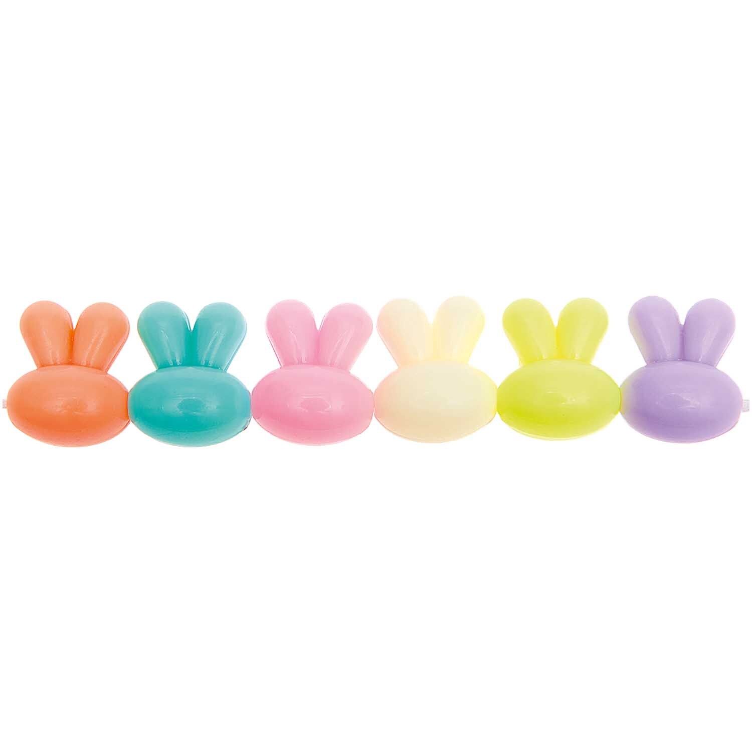 itoshii Hasen Perlen in Pastellfarben, 13x15mm, 9 Stück. Bunte Hasenperlen von Rico Design in einer Reihe.