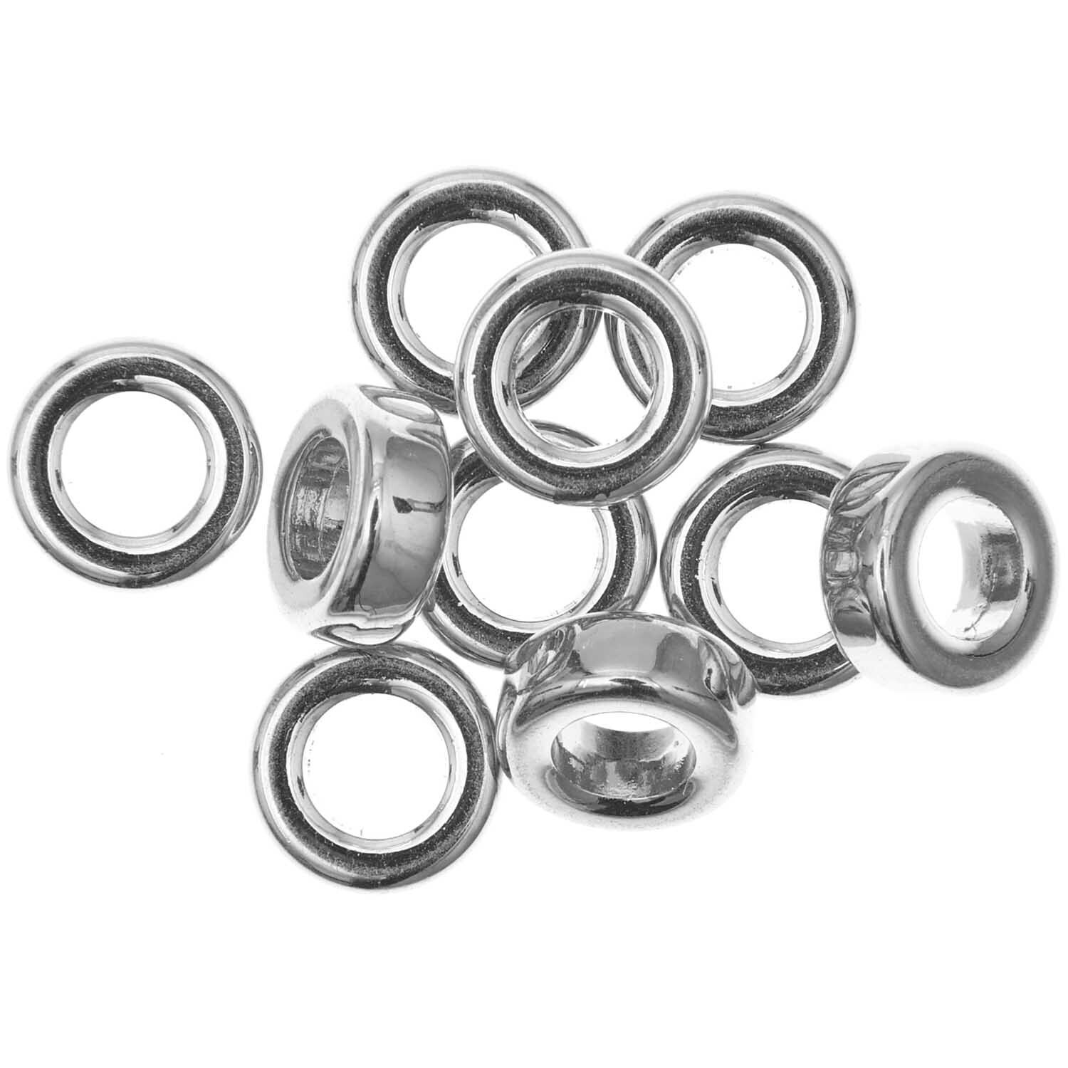 itoshii - Ponii Beads Ringe in Silber von Rico Design, 9x3,5mm, 10 Stück. Zehn glänzende, silberne Ringe in Nahaufnahme.
