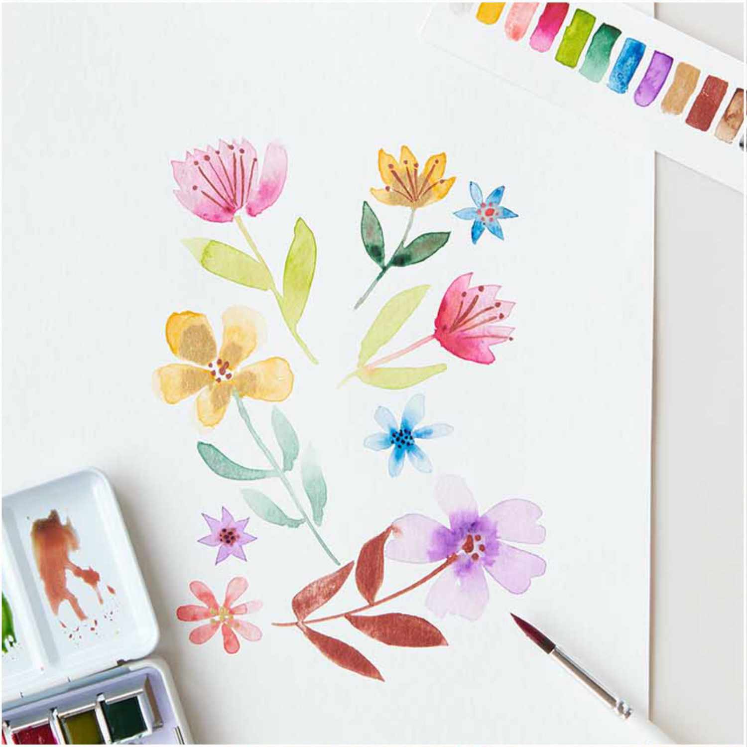 ART Master Aquarellfarbe halbes Näpfchen: Bunte Blumenillustration mit Aquarellfarben und Pinsel.