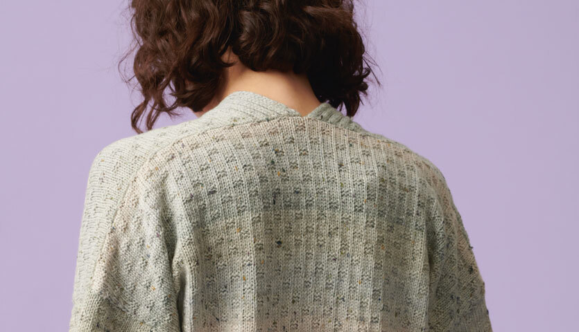 Strickanleitung für eine stilvolle Kurzarm-Jacke aus Fashion Cotton Light & Long Tweed dk in elegantem Design.
