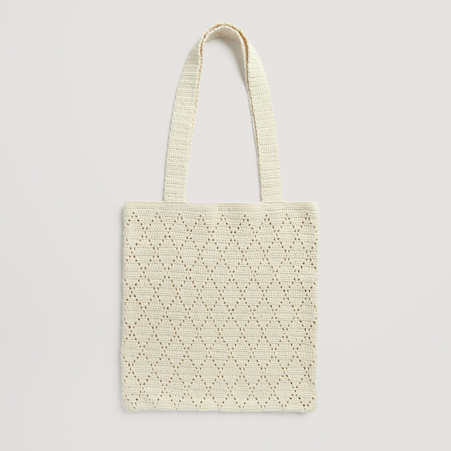 Häkelset Tasche Modell 06: Cremefarbene, gehäkelte Tasche von Rico Design mit Rautenmuster. Ideal für den Sommer aus Essentials Organic Cotton aran.