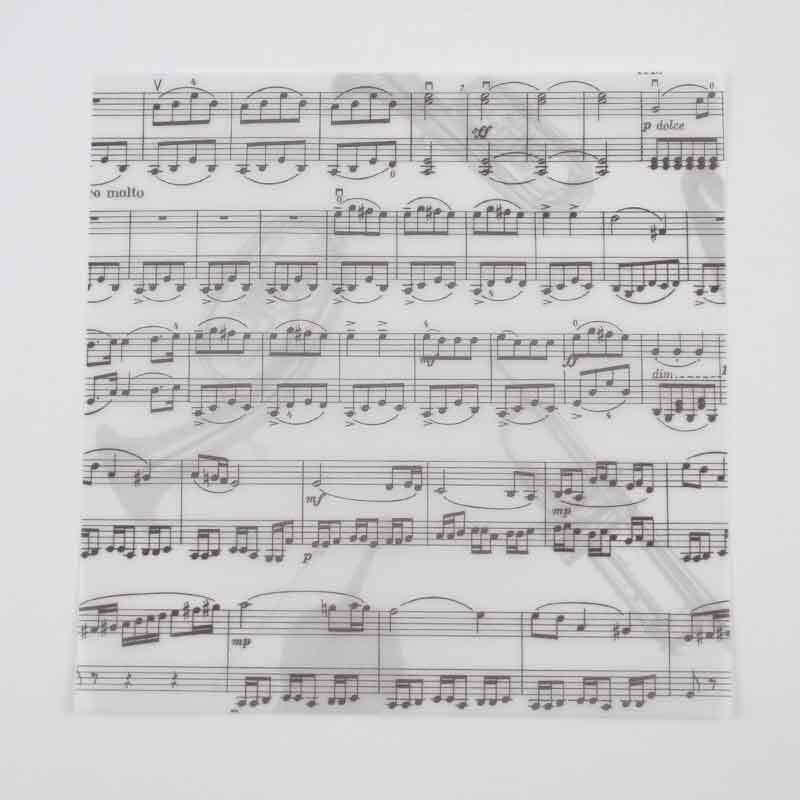 Faltblätter transparent Noten 15x15cm, 60 Blatt, zeigen ein elegantes Notenblatt-Design. Ideal für kreative Bastelprojekte.