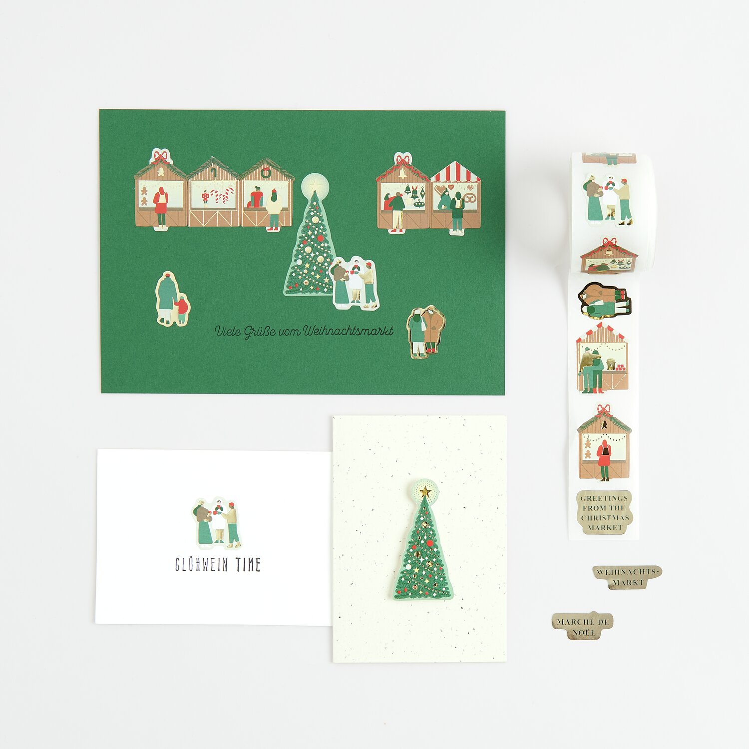 Paper Poetry Mini-Sticker Weihnachtsmarkt auf der Rolle, 120-teilig, zeigt festliche Motive auf grünem Hintergrund. Ideal für kreative Weihnachtsprojekte.