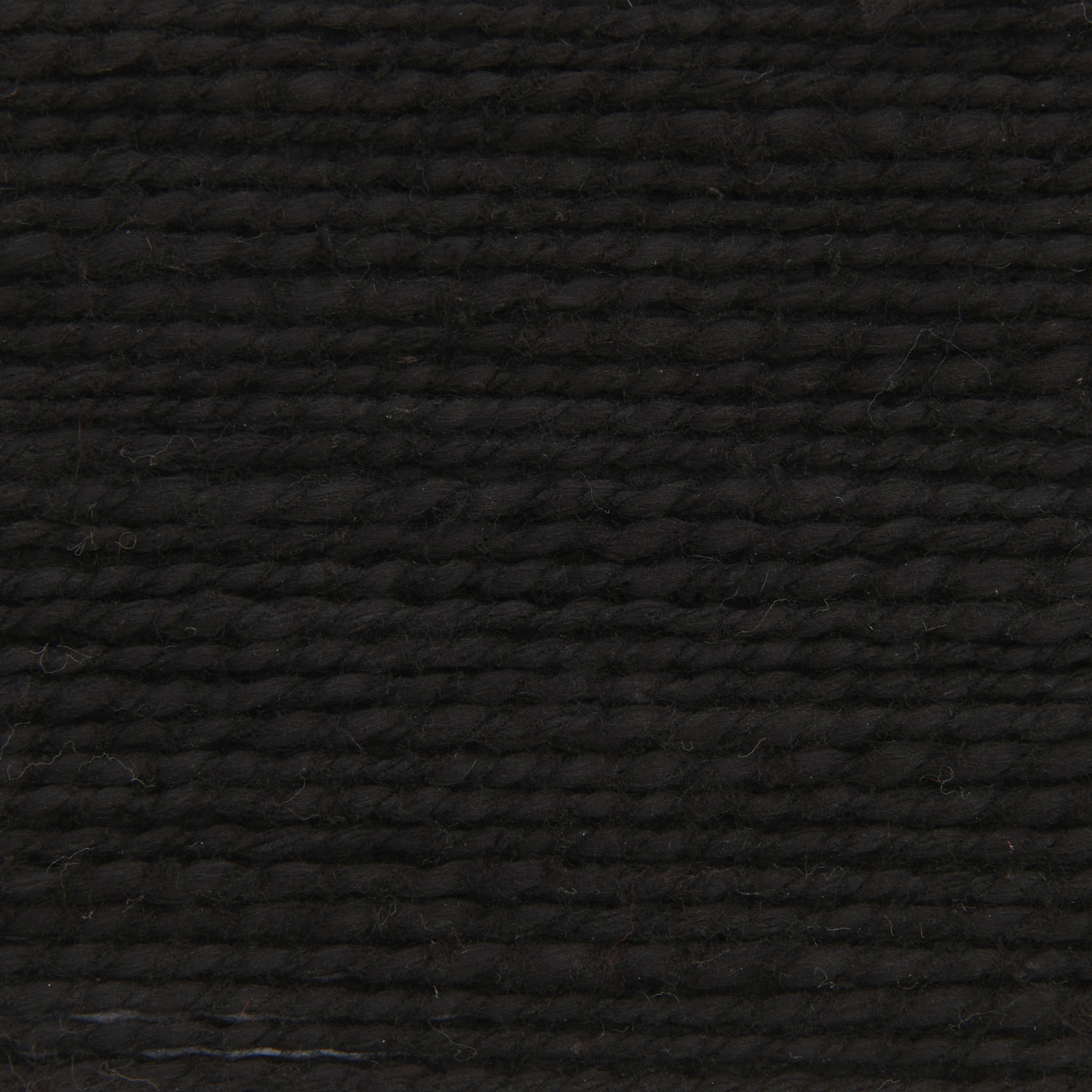 Essentials Super Cotton dk von Rico Design, schwarzes Garn, 50g, 100m, Nahaufnahme der Textur.
