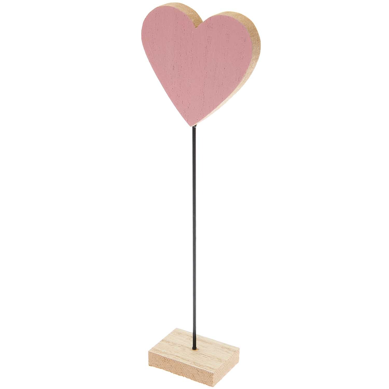 Deko-Aufsteller Herz in Rosa von Rico Design, 6x20cm, auf schwarzem Stab mit Holzsockel.