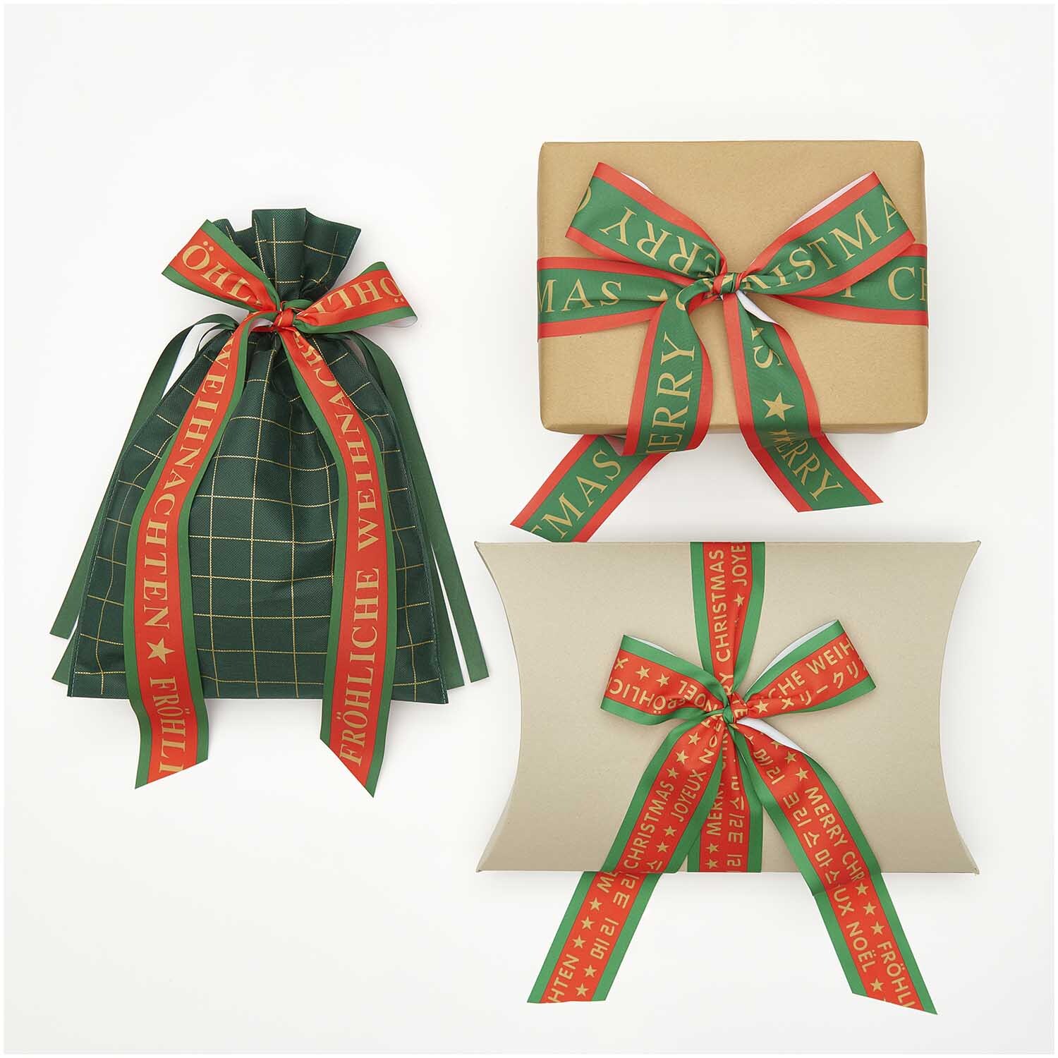 Paper Poetry Taftband Fröhliche Weihnachten verziert Geschenke mit festlichen roten und grünen Schleifen. Ideal für kreative Geschenkverpackungen.