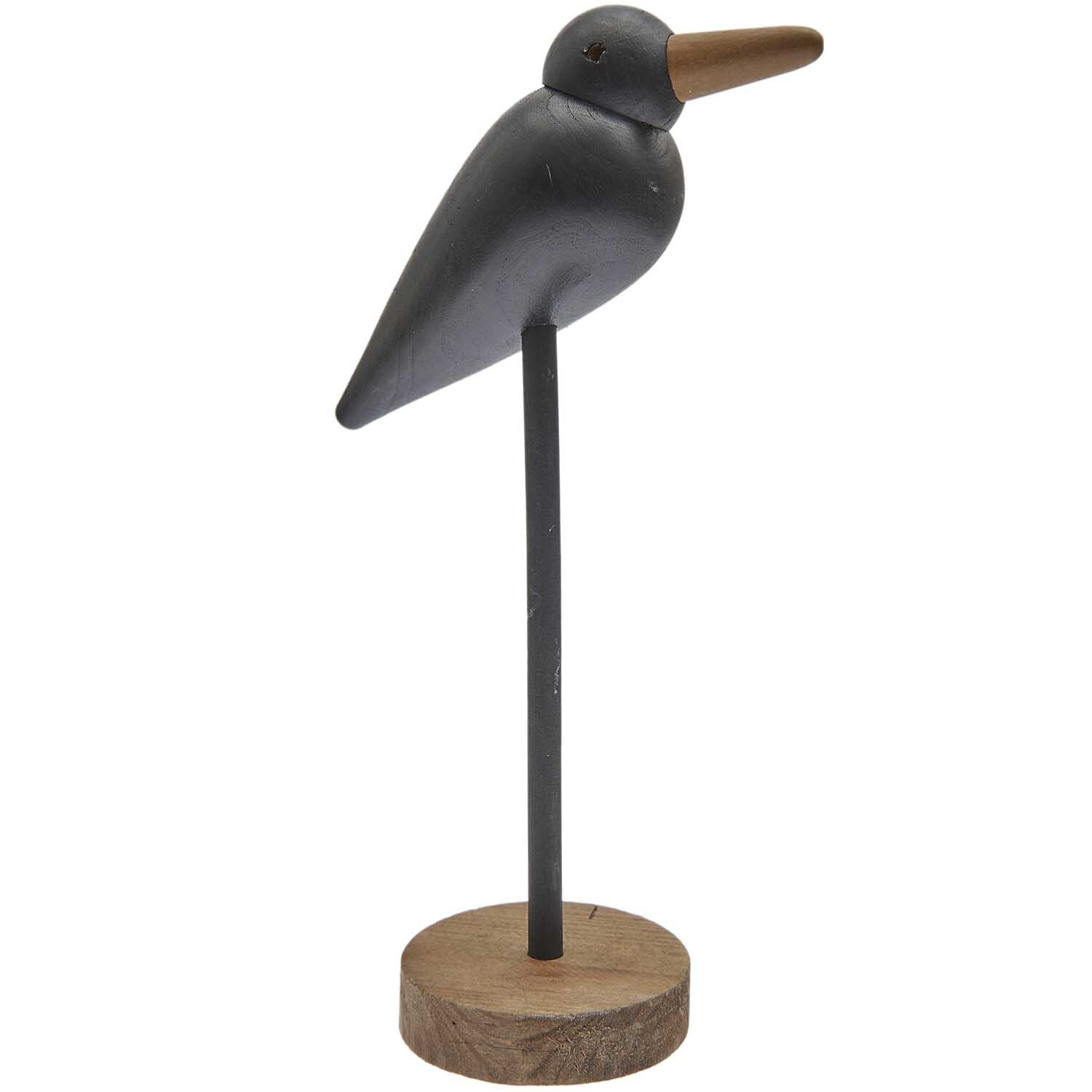 Aufsteller Möwe aus Holz von Rico Design, zeigt eine stilisierte schwarze Möwe auf Holzsockel.