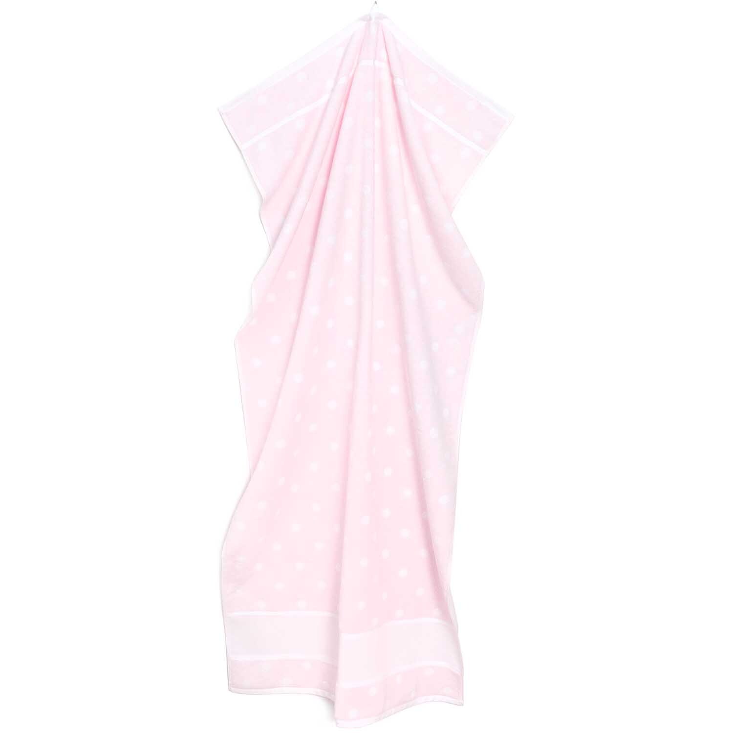 Duschtuch mit weißen Punkten 70x140cm, elegant drapiert, zeigt zarte rosa Farbe. Ideal für stilvolle Badezimmer.
