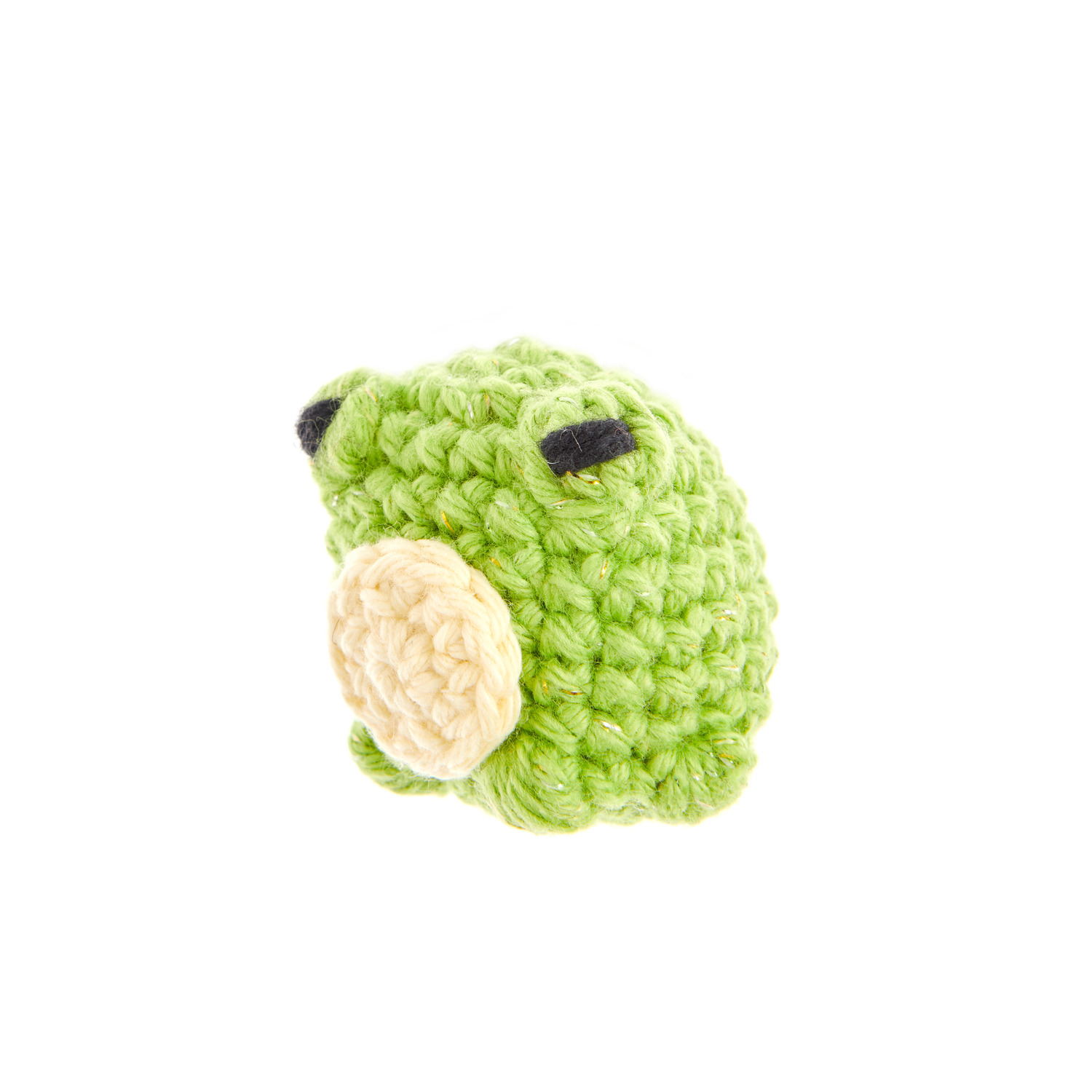 Creative Ricorumi dk: Handgehäkeltes, grünes Tier mit vanillefarbenem Bauch, ideal für DIY-Projekte.