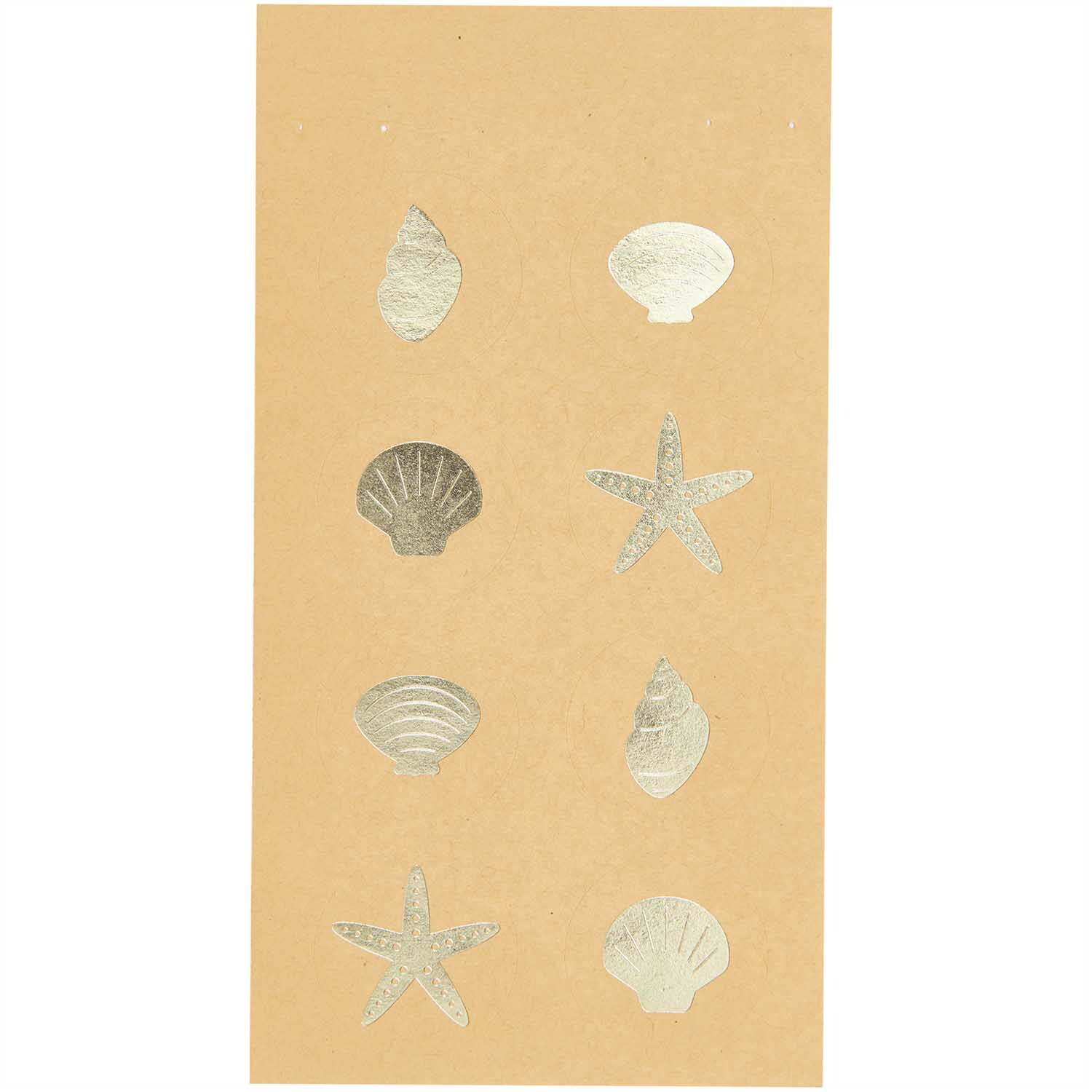 Paper Poetry Sticker Muscheln 4 Blatt: Goldene Muschel- und Seestern-Sticker auf braunem Hintergrund von Rico Design.