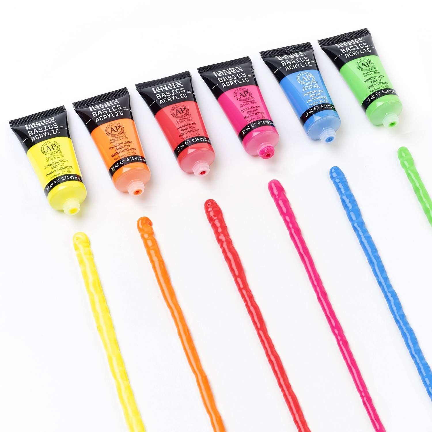 Basics Acrylfarben Set Neon 6x22ml zeigt sechs bunte Tuben von Liquitex mit passenden Farbstreifen.