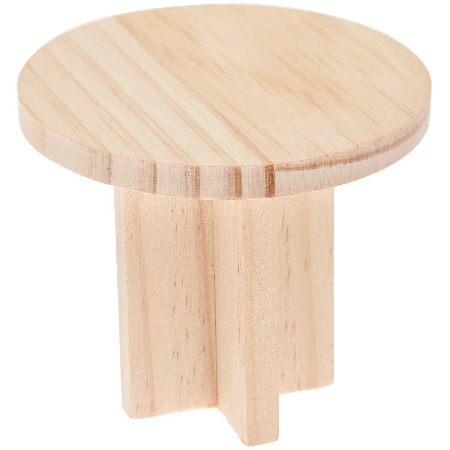 Miniatur Tisch rund aus hellem Holz mit glatter Oberfläche, ideal für Modellbauprojekte. Maße: 8x8x6,5cm.