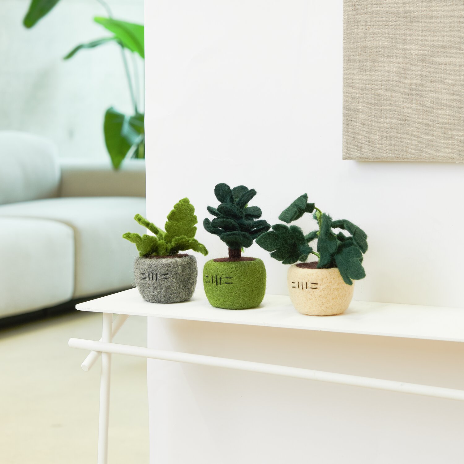 Filz Blumentopf Grau: Stilvoller grauer Topf von Rico Design, ideal für kleine Pflanzen.