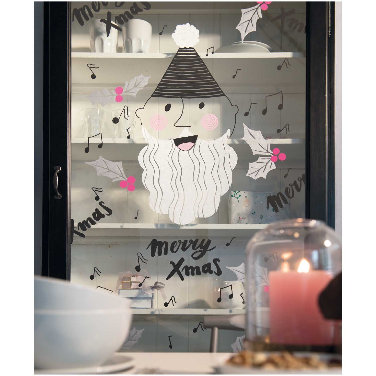 Vorlagenmappe Jolly Christmas: Fenster mit weihnachtlichen Kreidemalereien von Rico Design, inklusive Noten und Weihnachtsmannmotiv.