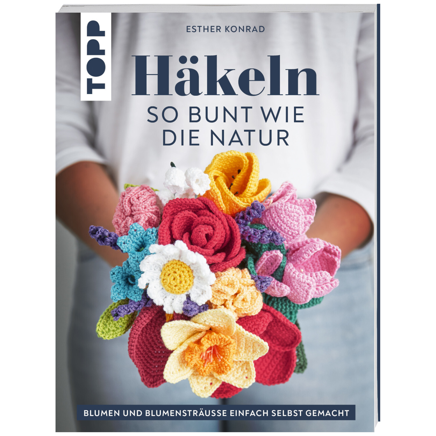 Häkeln so bunt wie die Natur: Buntes Blumenarrangement aus Garn, präsentiert von TOPP.