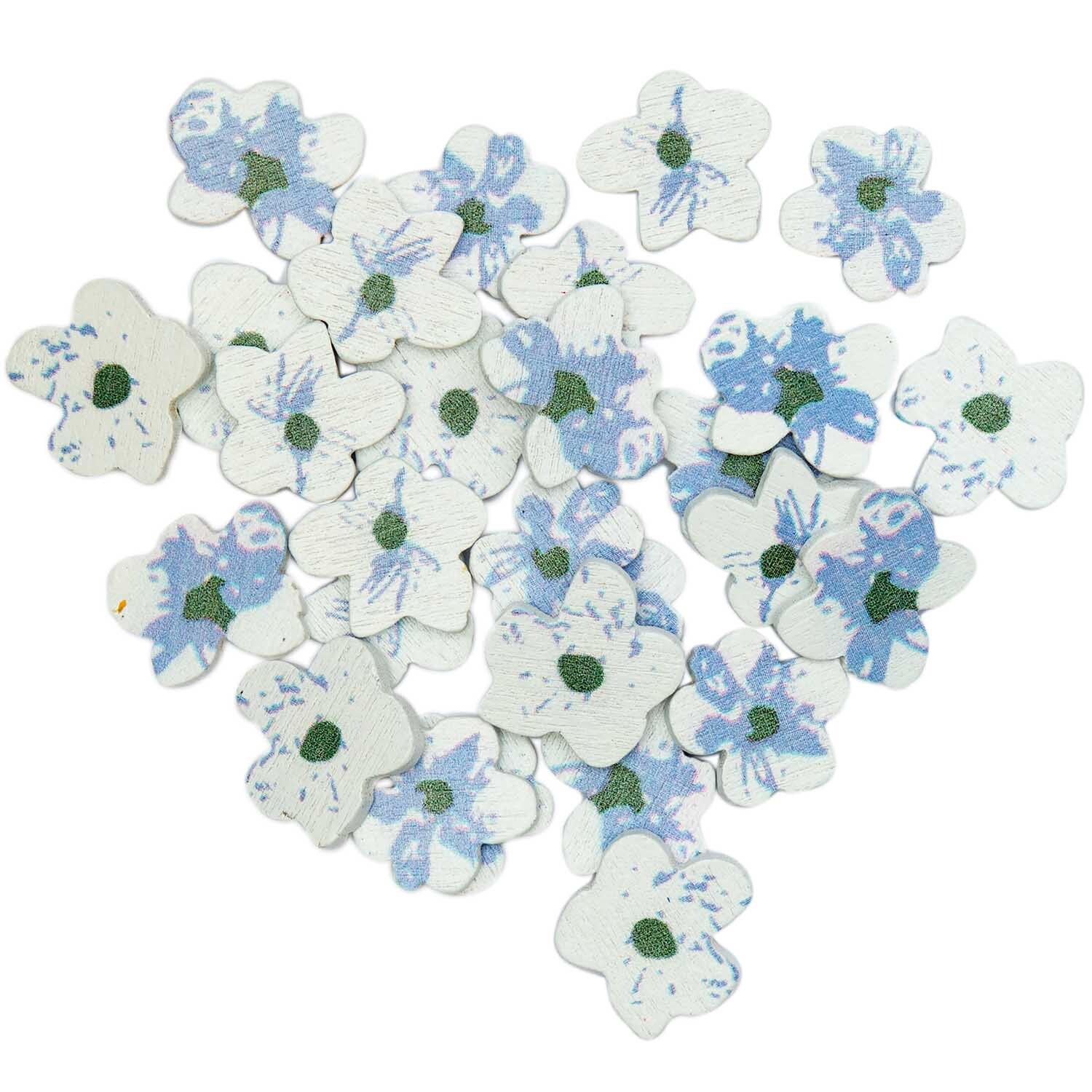 Holzstreu Blüten Mix blau 24 Stück zeigt dekorative, blaue Blüten aus Holz von Rico Design.