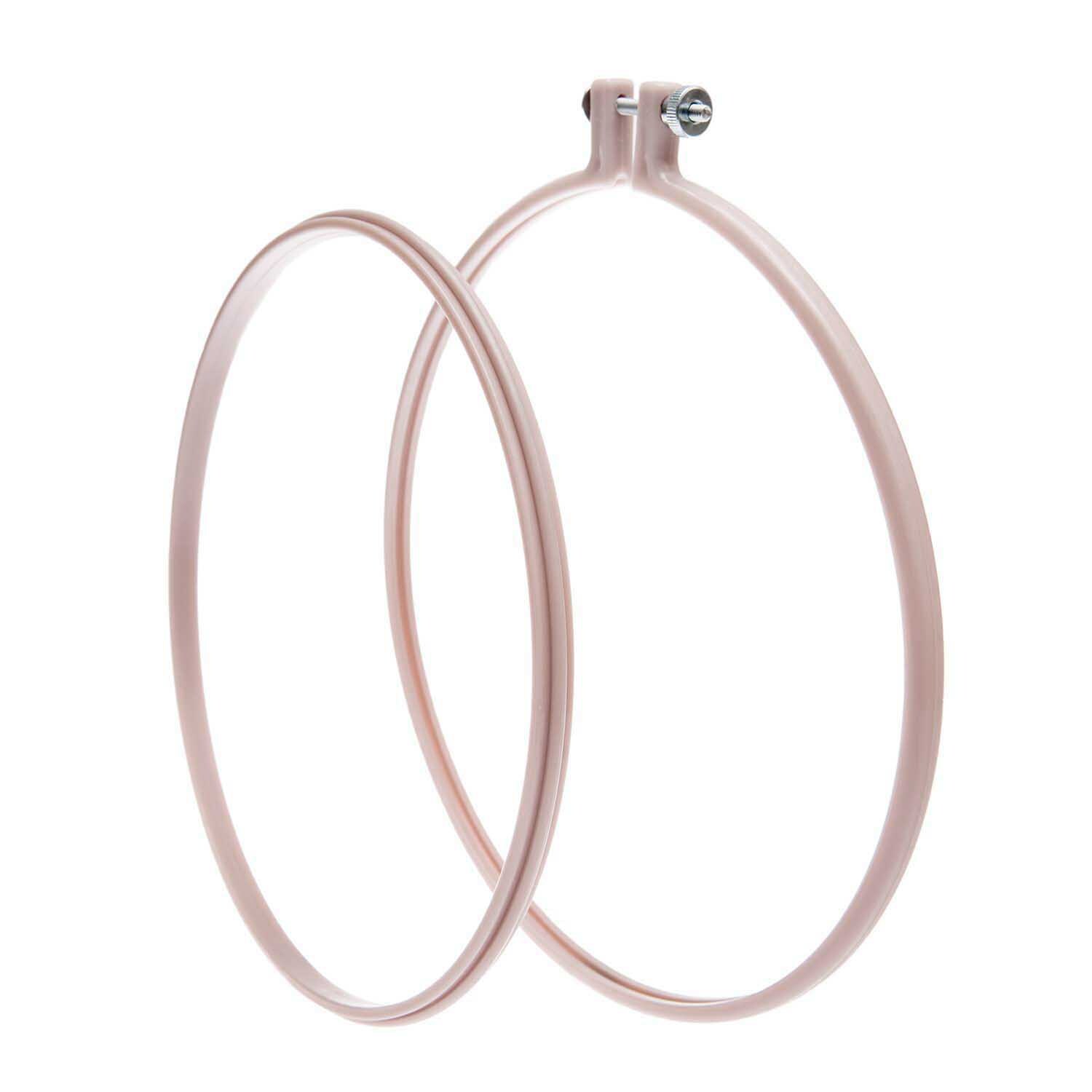 Stickring aus Kunststoff mauve 20,3cm von Rico Design, zeigt zwei rosa Ringe in Nahaufnahme.