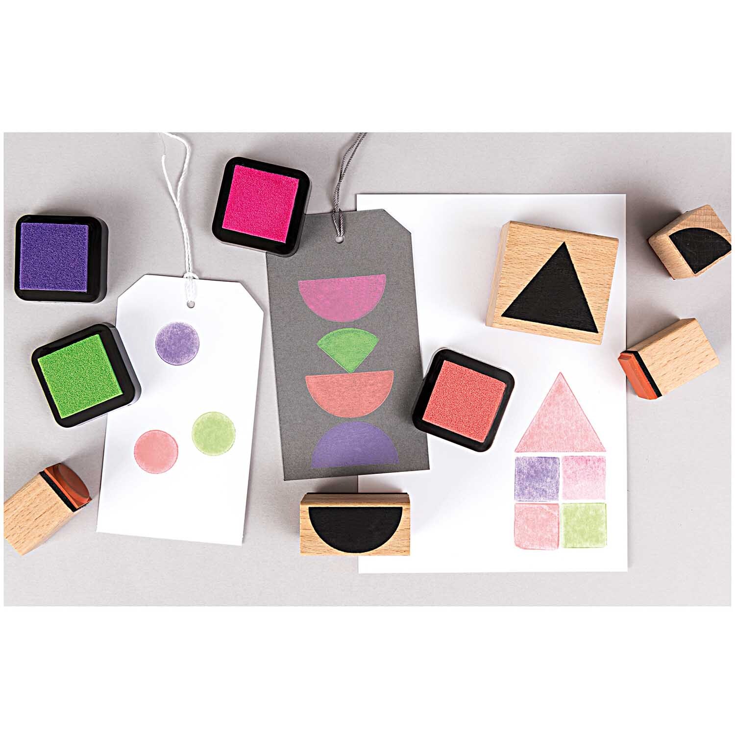 Paper Poetry Stempelset mit geometrischen Symbolen und bunten Stempelkissen von Rico Design.