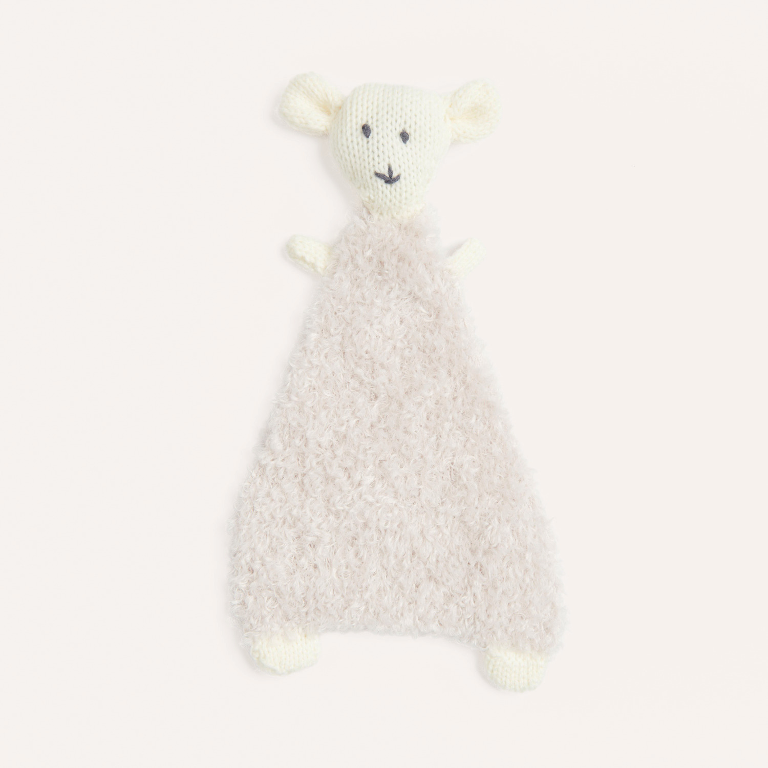 Strickset Schmusetuch Modell 06 zeigt ein weiches, handgemachtes Tuch aus Rico Baby 040 in sanften Pastelltönen.
