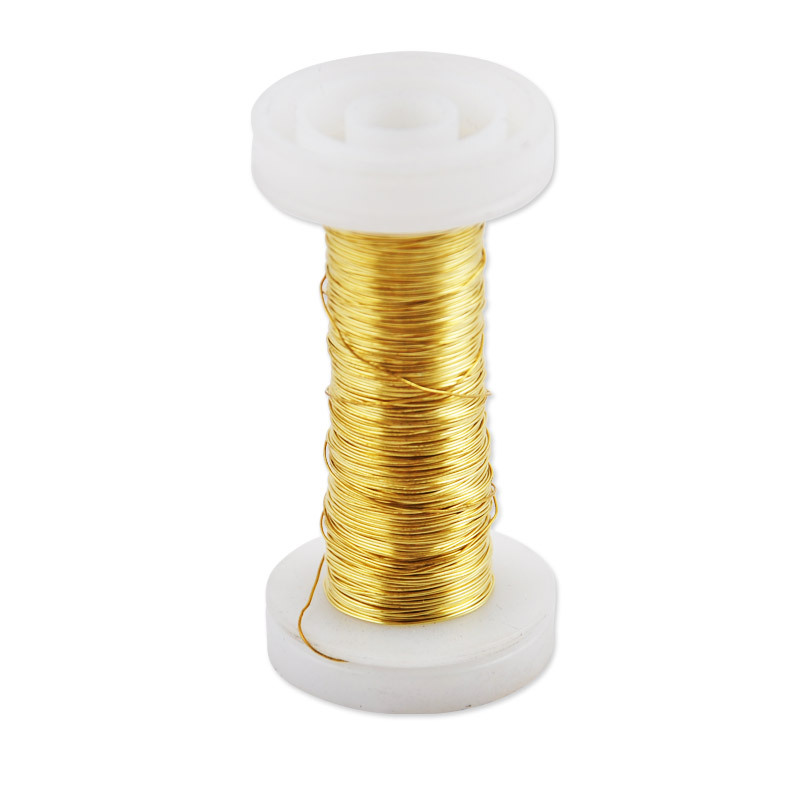 Schmuckdraht 0,25mm 50m auf einer weißen Spule, goldene Farbe, ideal für kreative Bastelprojekte.