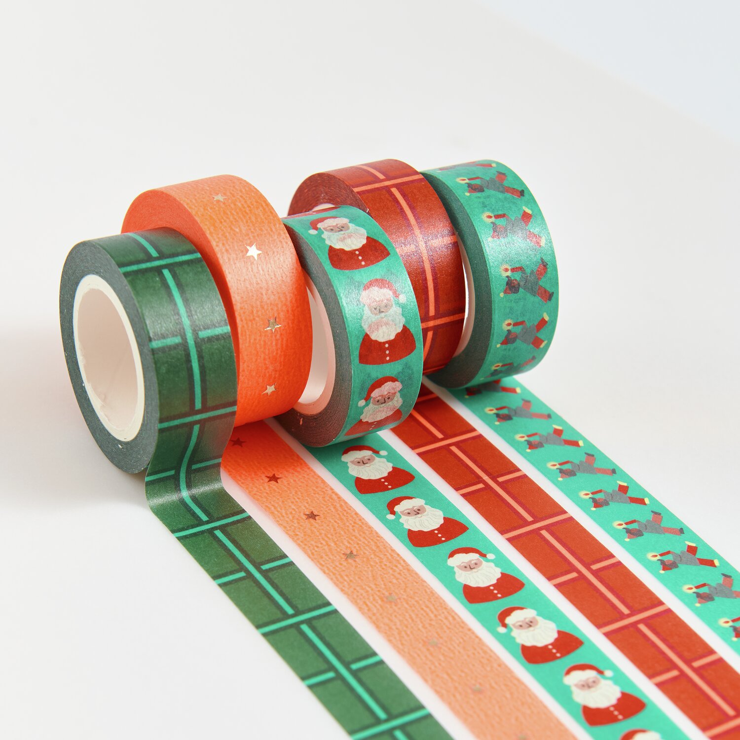 Paper Poetry Tape Set Weihnachtsmarkt Neon, 5-teilig. Bunte Klebebänder mit Weihnachtsmotiven in Grün, Rot und Orange. Ideal für kreative Projekte.