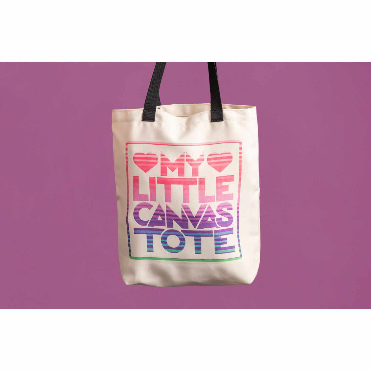 Einkaufstasche natur 48x35,5cm mit buntem Schriftzug "My Little Canvas Tote" auf lila Hintergrund.