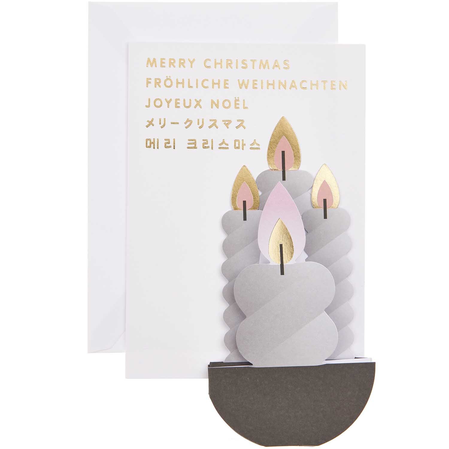 Paper Poetry Zickzack-Karte zeigt graue Kerzen mit Flammen, begleitet von Weihnachtsgrüßen in mehreren Sprachen.