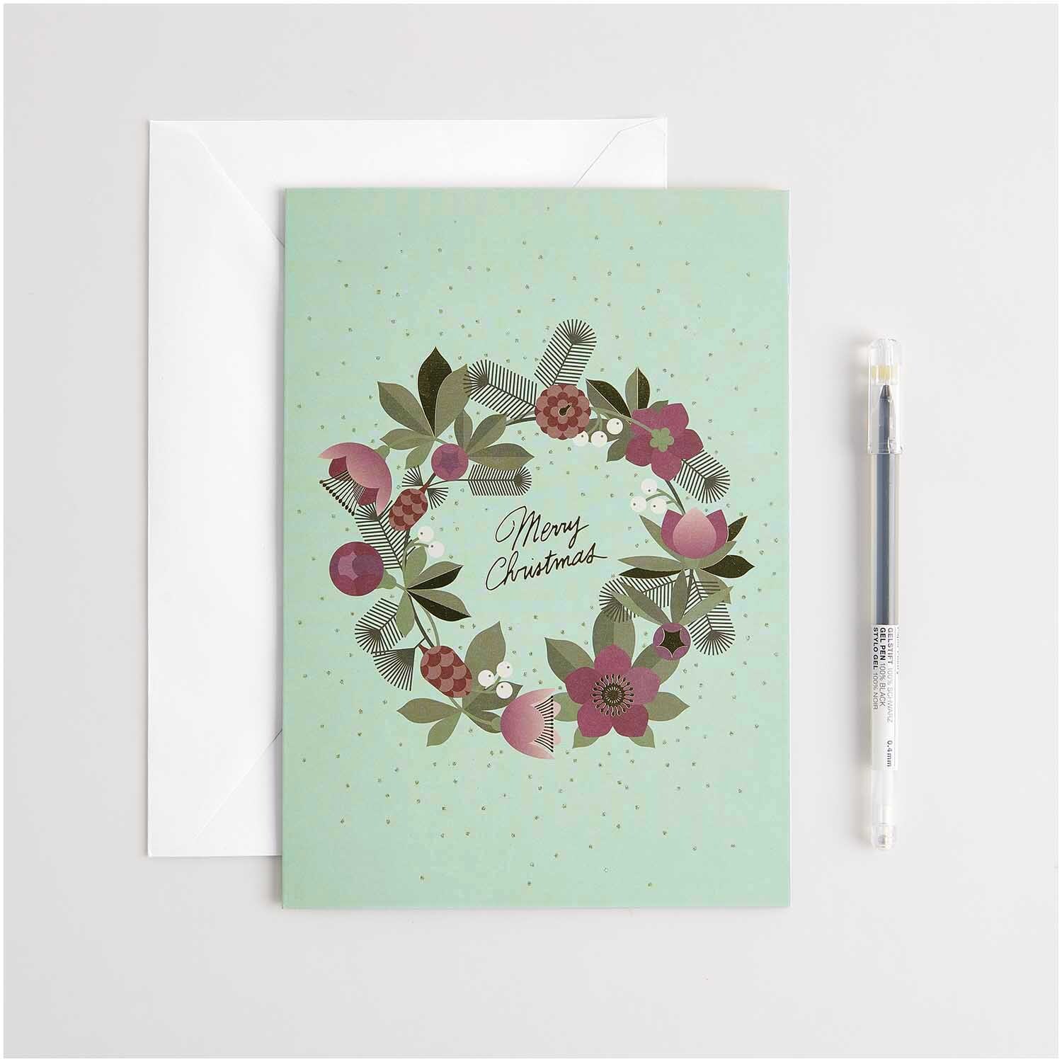 Paper Poetry Kartenset Helleborus A5 mit floraler Kranzillustration und "Merry Christmas"-Schriftzug, 16-teilig, von Rico Design.