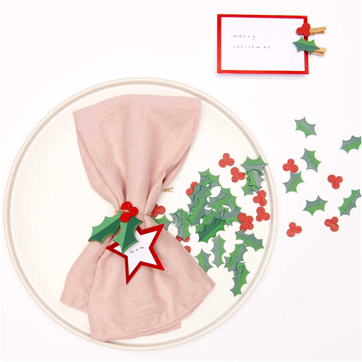 Paper Poetry Tischkarten mit Hot Foil, dekoriert mit weihnachtlichen Motiven und roten Akzenten.