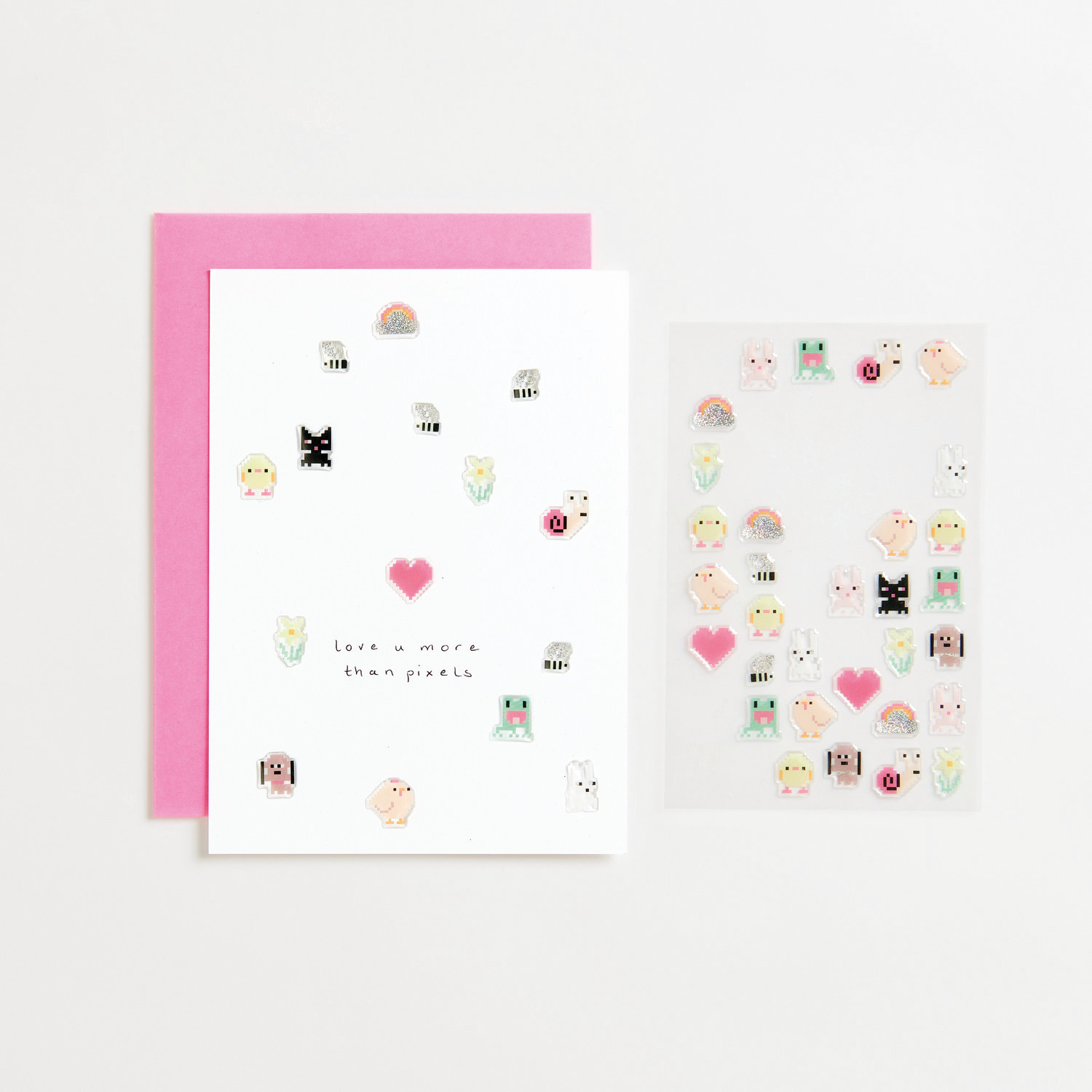 Paper Poetry Gelsticker Pixel: Ein Blatt mit bunten Pixel-Gelstickern von Rico Design auf weißem Hintergrund.