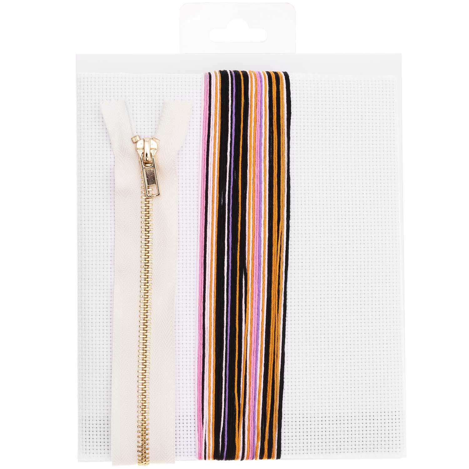 Stickpackung Etui Acid Leo 17x22,5cm von Rico Design zeigt bunte Stickfäden und einen Reißverschluss auf weißem Hintergrund.