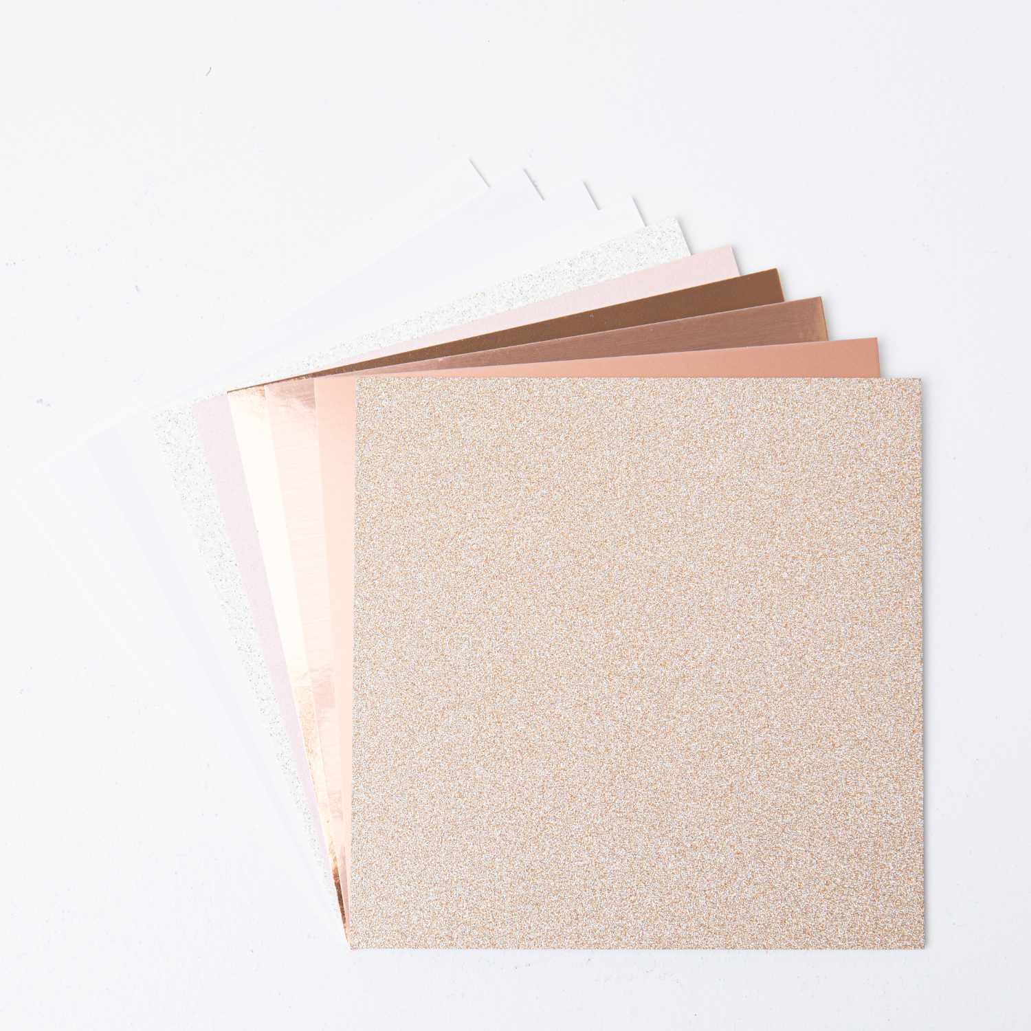 Big Shot Starter Set, Sizzix: A5-Papier in schimmernden Tönen, ideal für kreative Bastelprojekte.