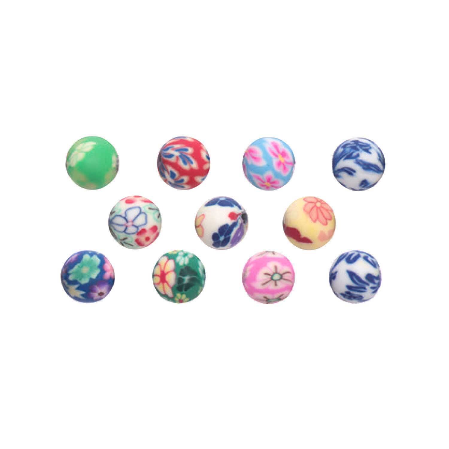 Kugeln multicolor 6mm 20 Stück von Rico Design: Mehrfarbige Perlen mit floralen Mustern, ideal für kreative Bastelprojekte.