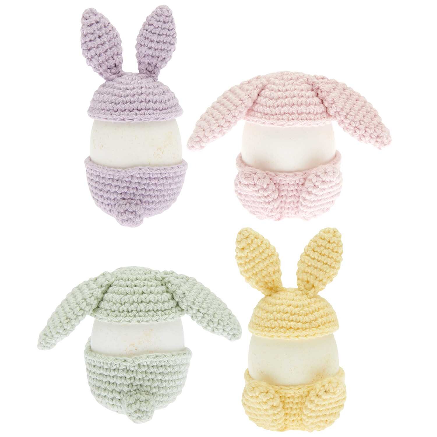 Ricorumi Häkelset - Eierbecher mit bunten, gehäkelten Hasenohren in Pastellfarben von Rico Design.