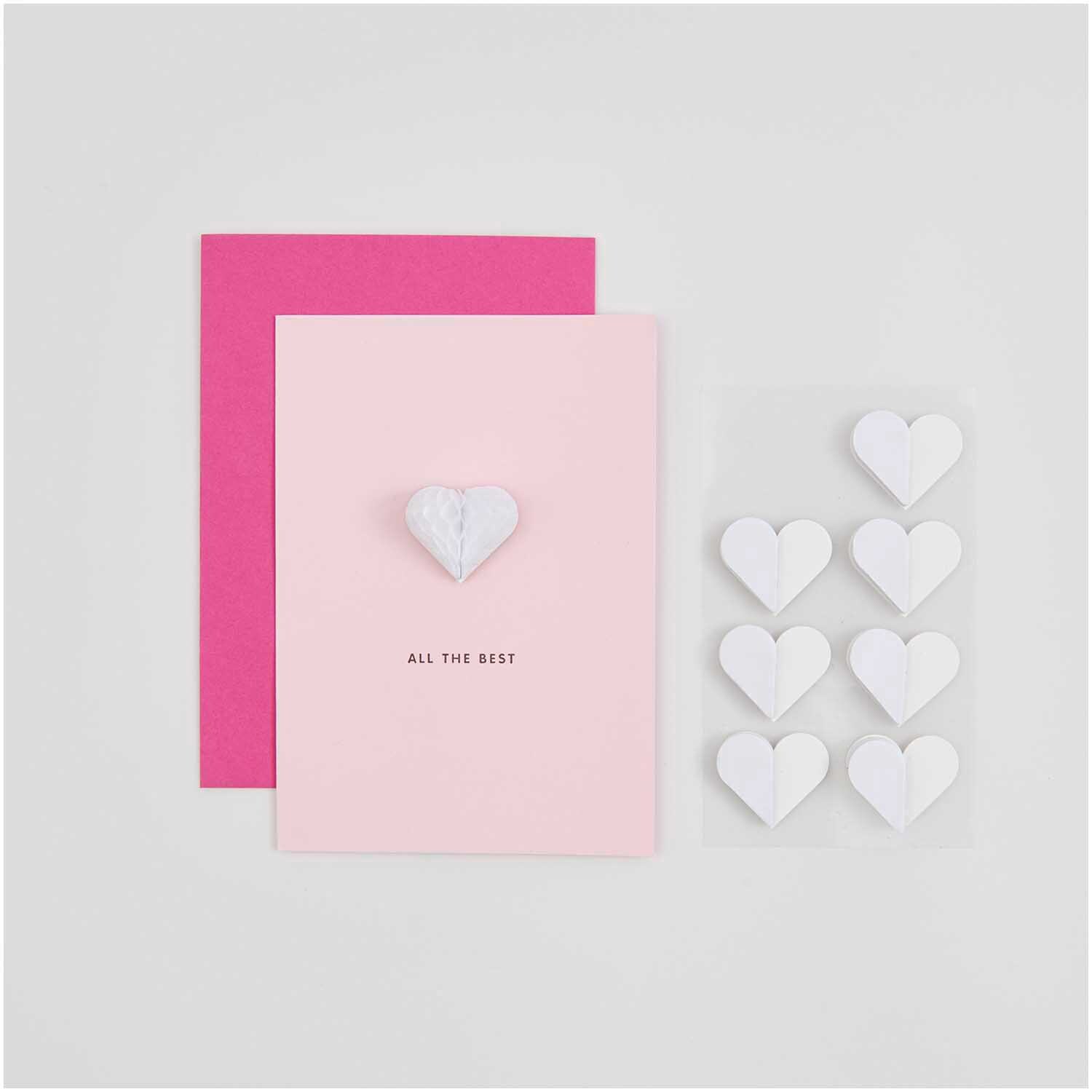 Paper Poetry Wabenpapiersticker Herzen auf rosa Karte mit weißem Herzmotiv und pinkem Umschlag.