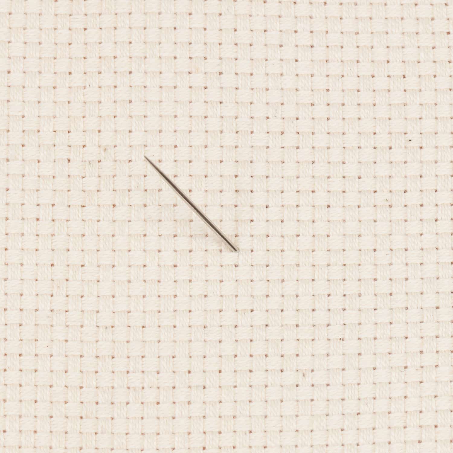 Schritt 1 in der Stickanleitung für einen gezählten Kreuzstich