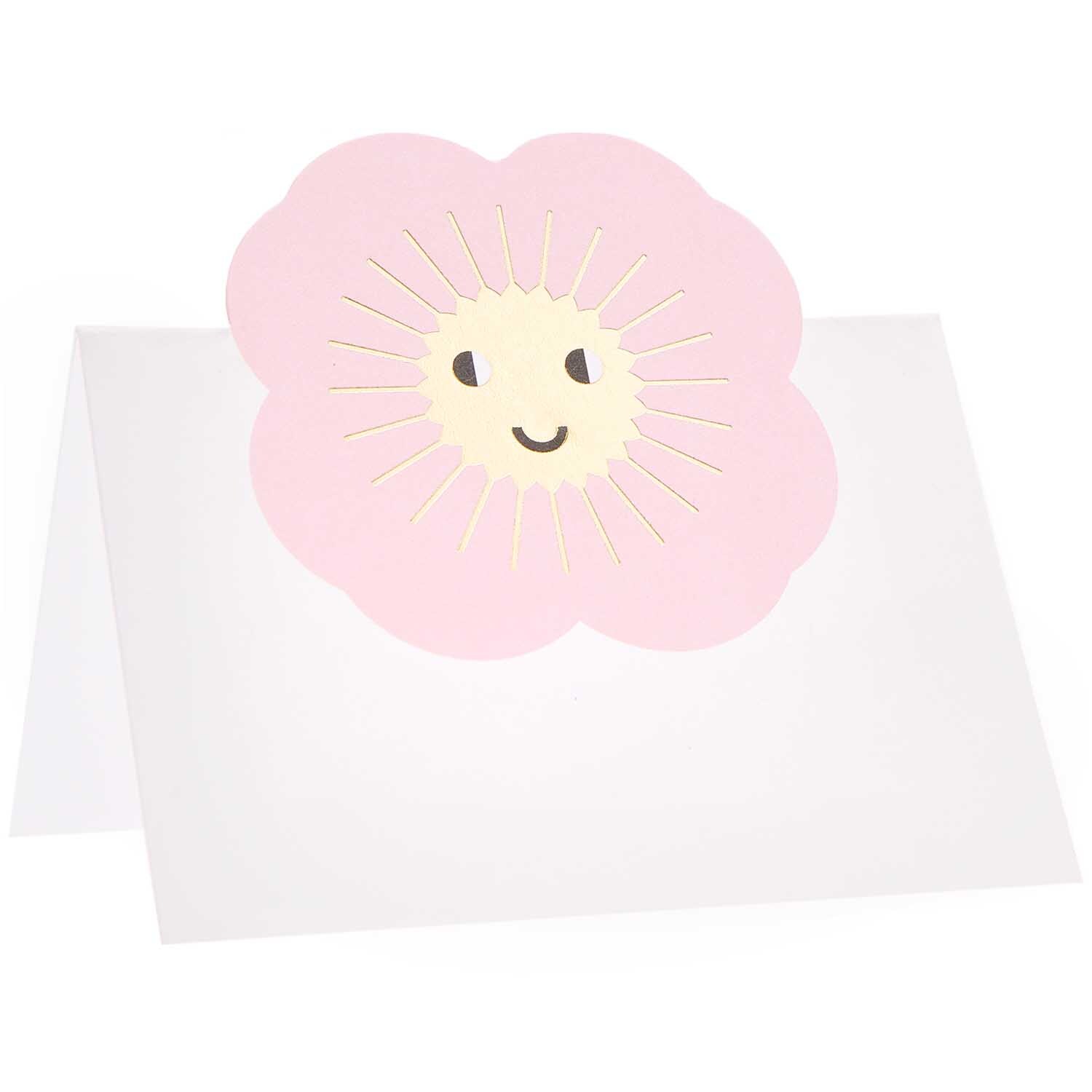 Paper Poetry Tischkarten mit rosa Blume und lächelndem Gesicht, ideal für kreative Tischdekorationen.