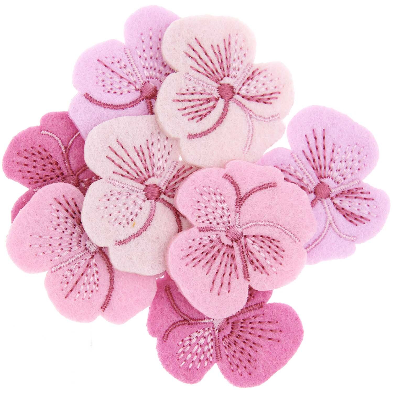 Filzstreu Stiefmütterchen bestickt Rosa: Acht rosa Filzblumen von Rico Design, dekorativ bestickt.