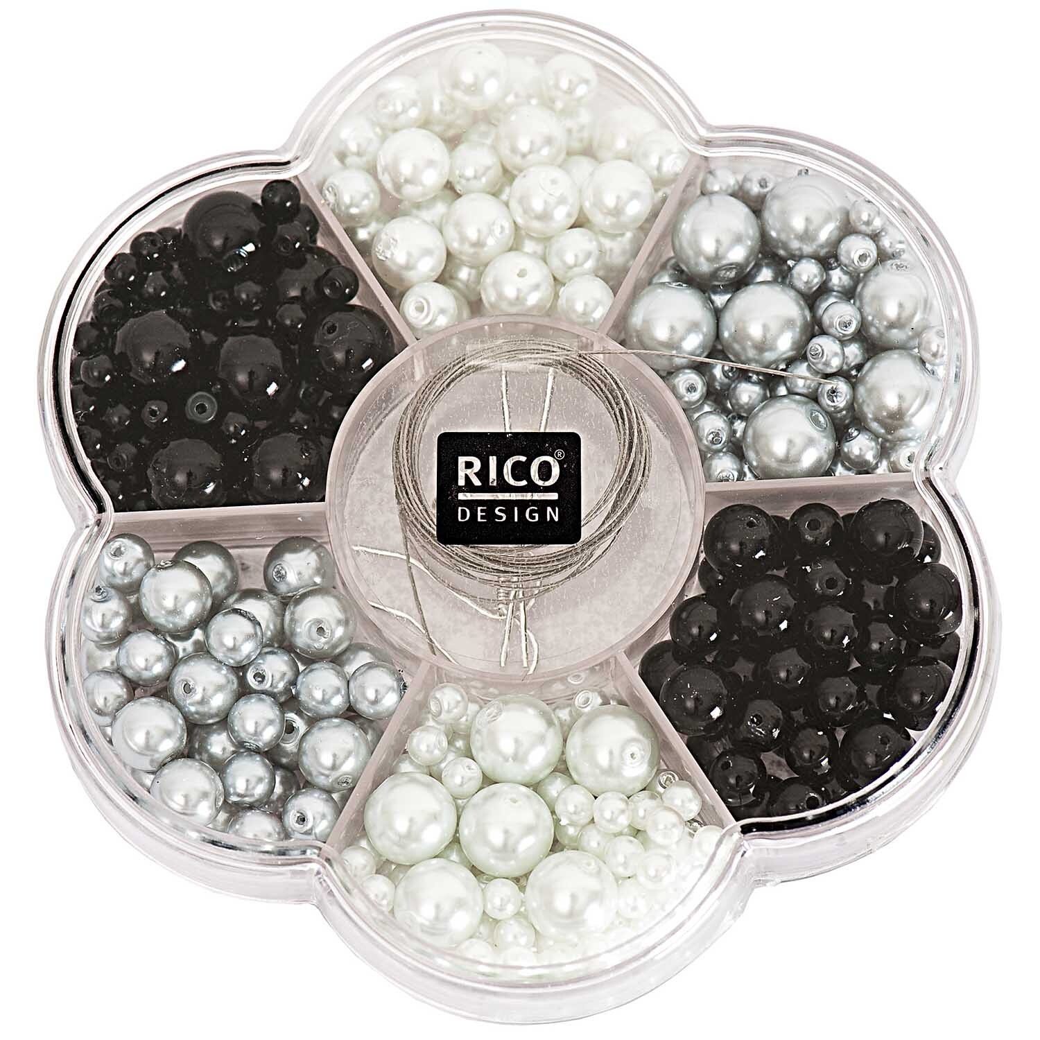 Renaissance Perlen-Set in einer Blumenform-Box mit schwarzen und weißen Perlen von Rico Design.