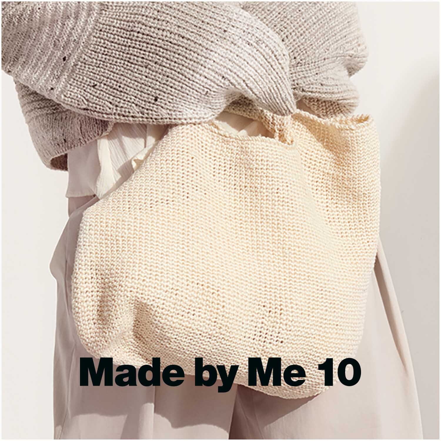 Creative Natur: Stricktasche in Creme, getragen von einer Person. Perfekt für DIY-Projekte.