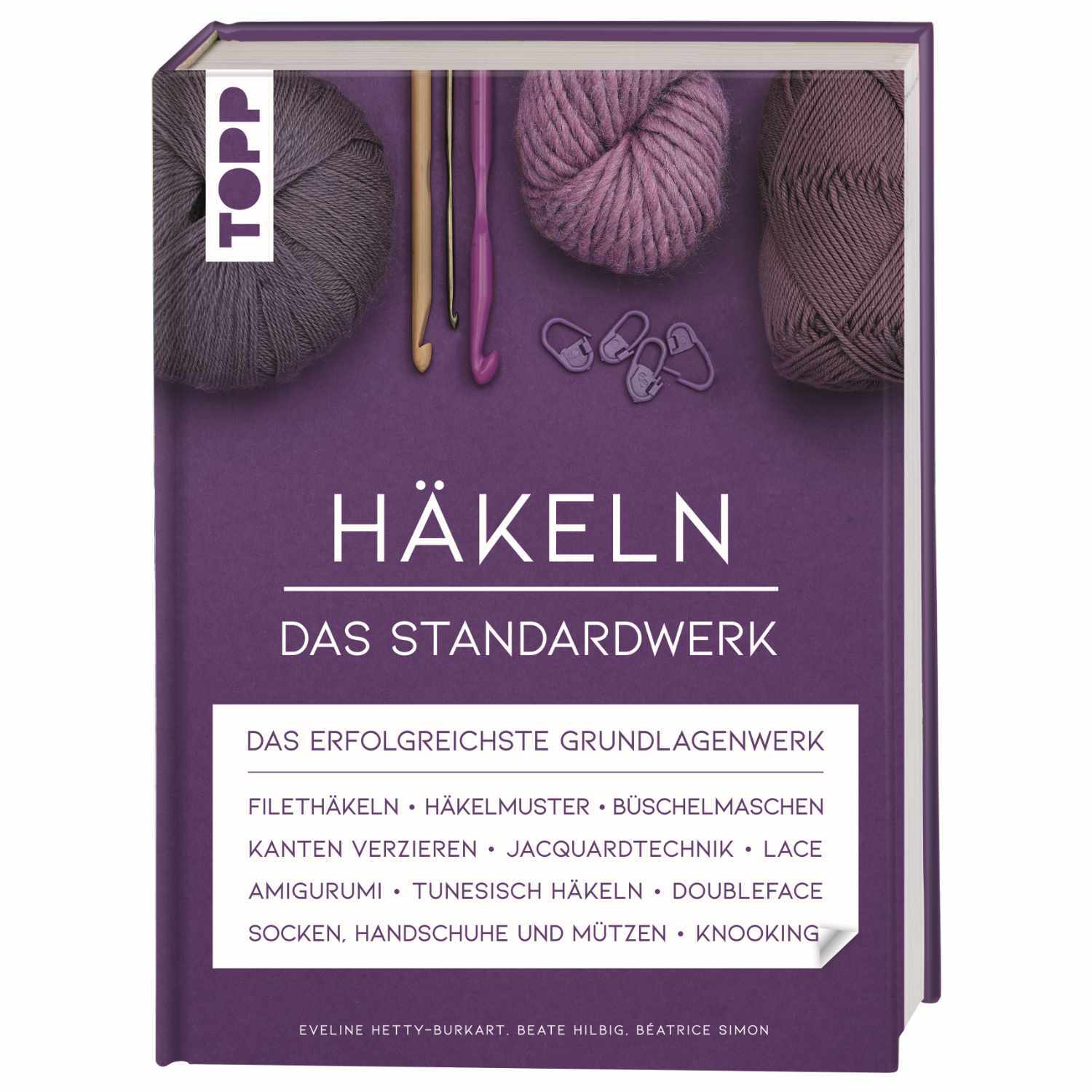 Häkeln - Das Standardwerk: Lila Buch mit Garn und Häkelnadeln, Marke TOPP, umfassende Häkelanleitungen.