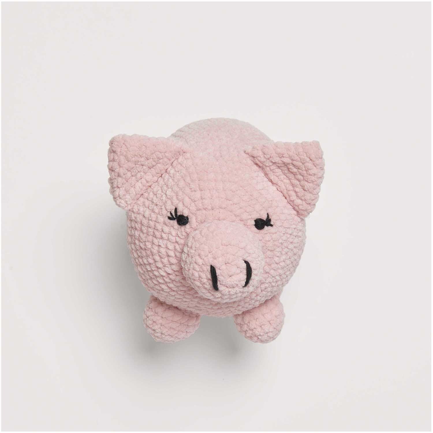 Häkelset Schweinchen Modell 13 aus Baby Chenillove: Rosa gehäkeltes Schweinchen aus weicher Chenille-Wolle, ideal für kreative Handarbeitsprojekte.